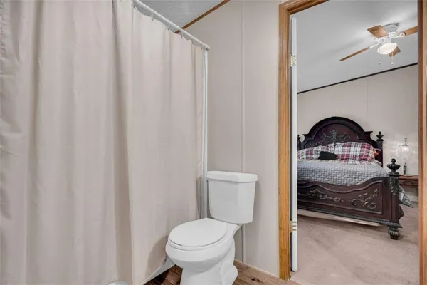 a bathroom with a tub and shower