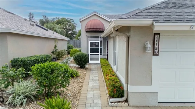 a house view with a garden space