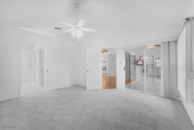 a bathroom with a shower and a sink