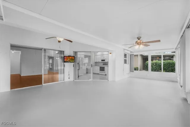 a view of a house with yard and a garden