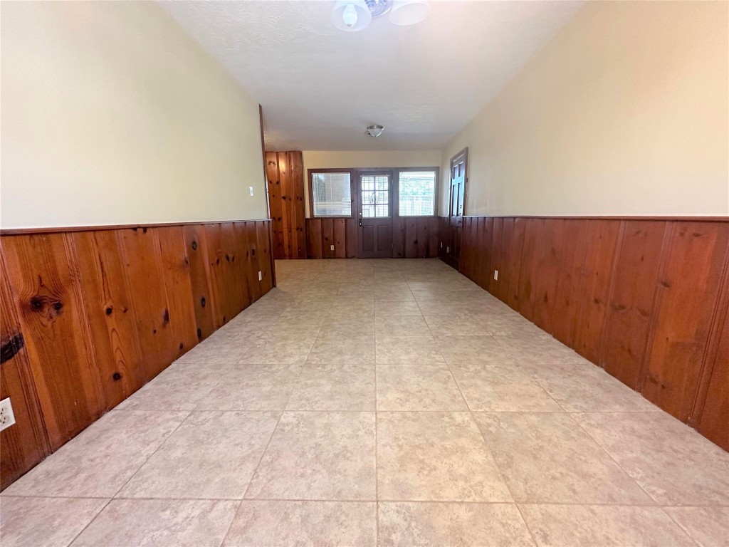 903 Lamonte Lane Houston, TX 77018 - Photo 13 of 36 wooden floor in an empty room with a window