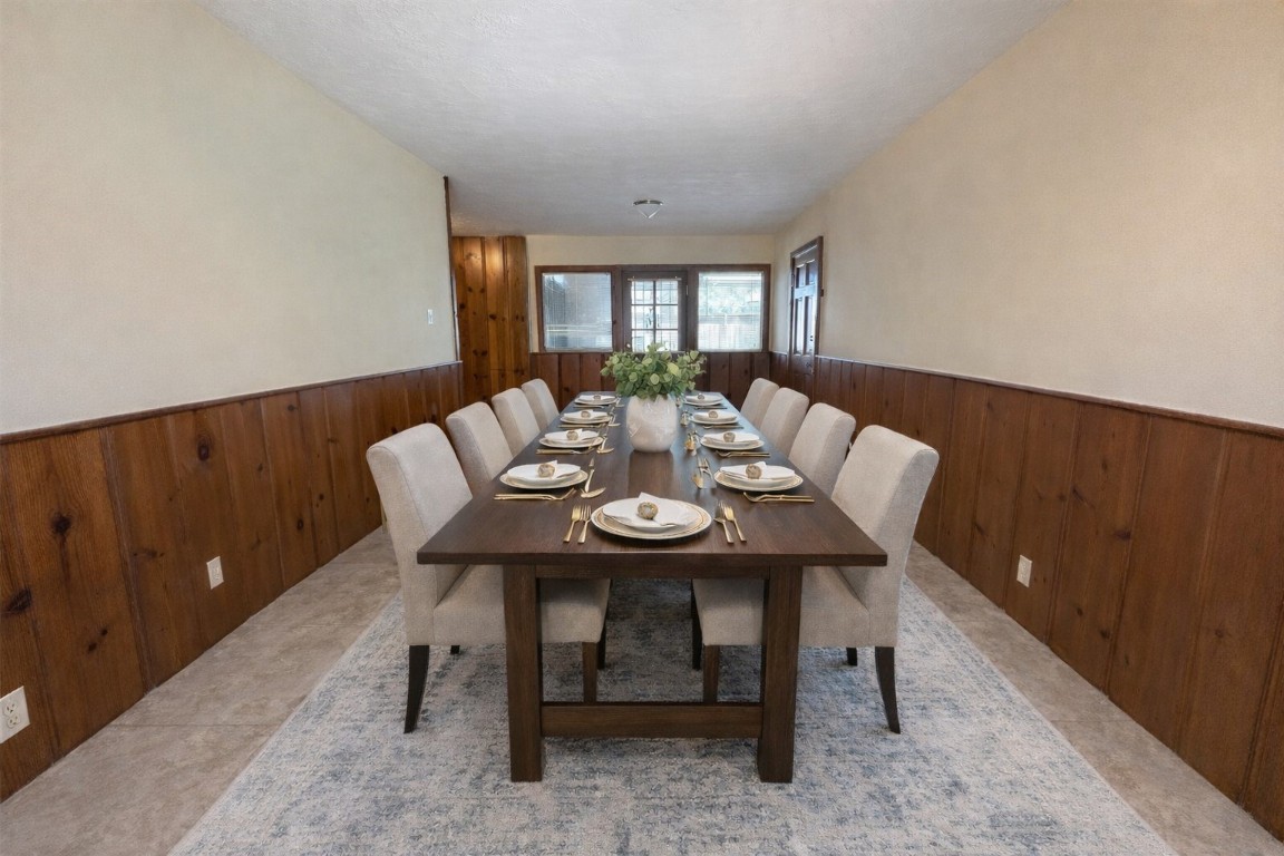 903 Lamonte Lane Houston, TX 77018 - Photo 14 of 36 a view of a dining room with furniture and chandelier