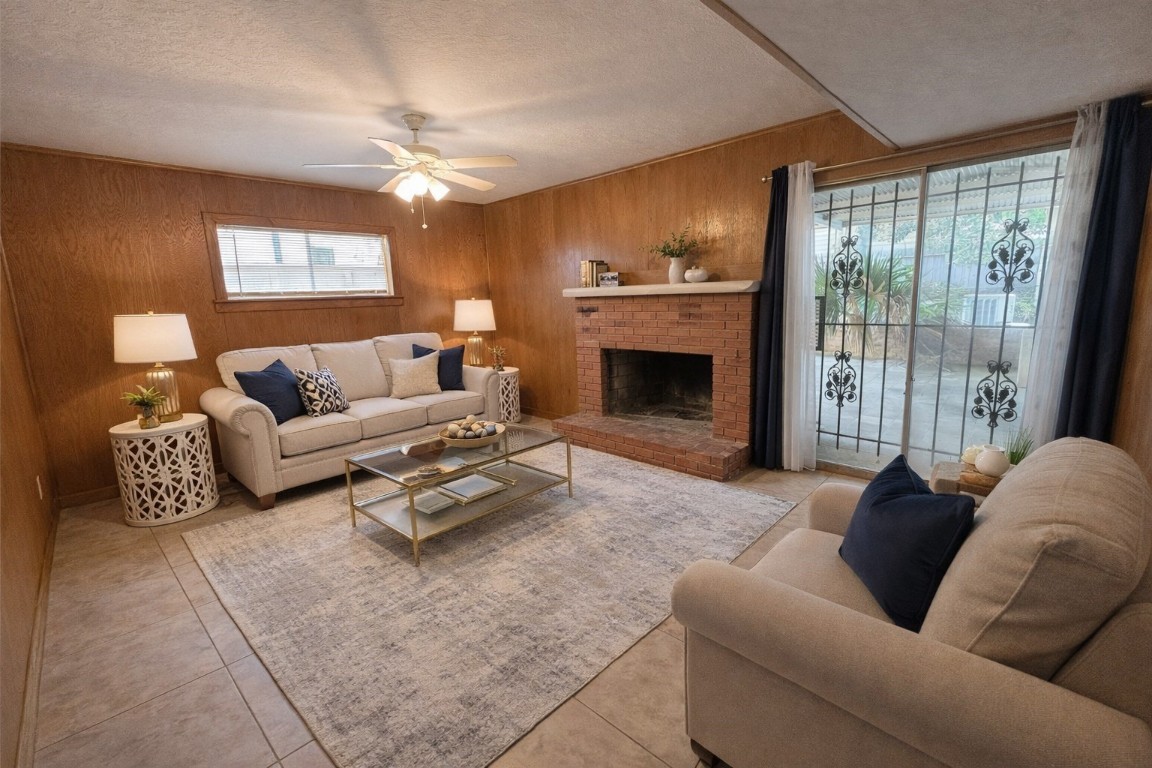903 Lamonte Lane Houston, TX 77018 - Photo 16 of 36 a living room with furniture and a fireplace