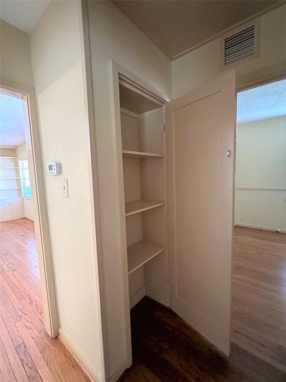 903 Lamonte Lane Houston, TX 77018 - Photo 23 of 36 a view of an empty walk in closet