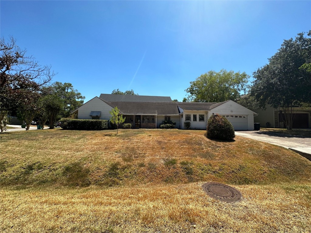903 Lamonte Lane Houston, TX 77018 - Photo 36 of 36 a front view of house with yard and trees in the background