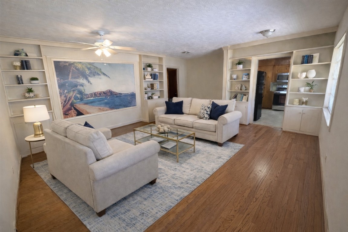 903 Lamonte Lane Houston, TX 77018 - Photo 5 of 36 a living room with furniture and a large window