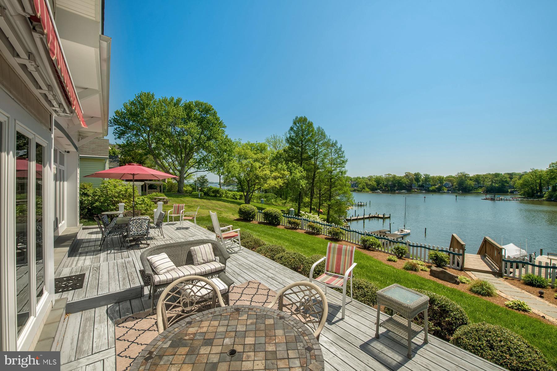 503 Broadwater Road Arnold, MD 21012 - Photo 3 of 30 a view of a lake with outdoor seating space