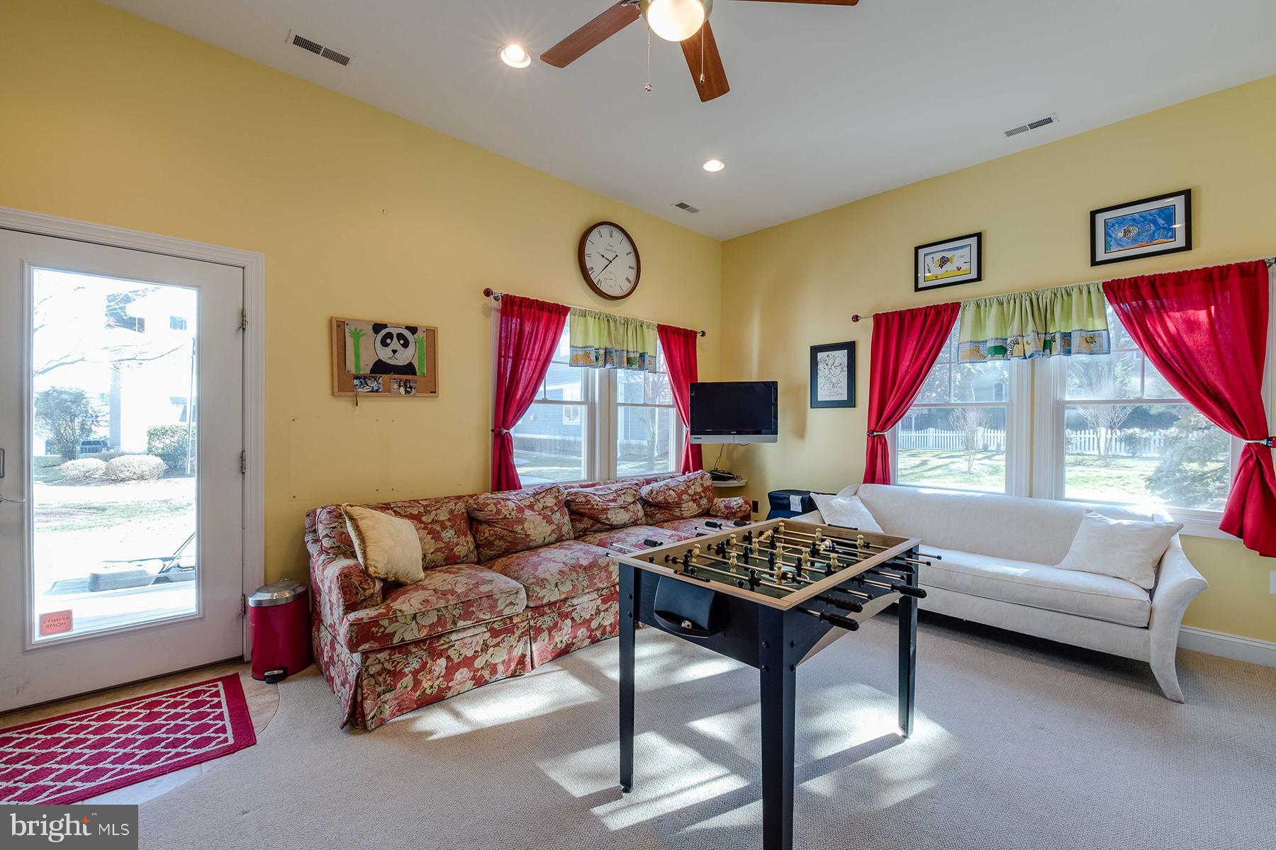 503 Broadwater Road Arnold, MD 21012 - Photo 23 of 30 a living room with furniture and a window