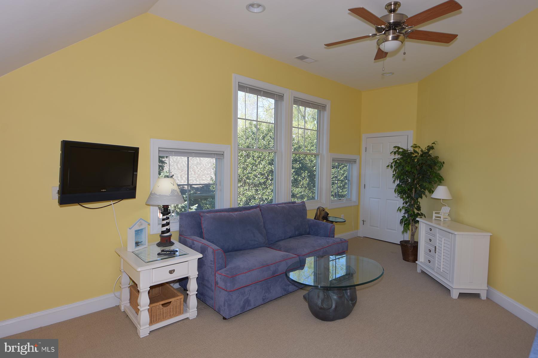 503 Broadwater Road Arnold, MD 21012 - Photo 24 of 30 a living room with furniture and a flat screen tv