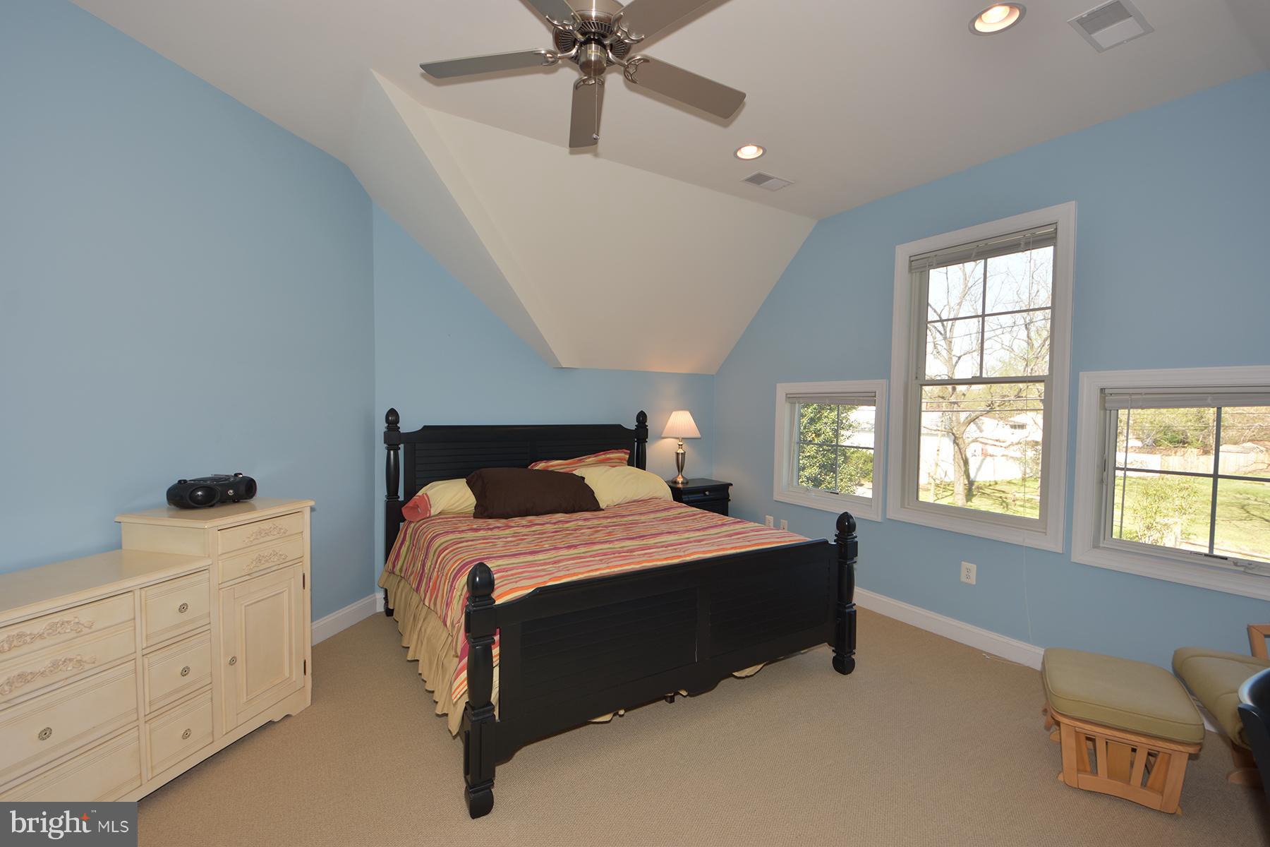 503 Broadwater Road Arnold, MD 21012 - Photo 25 of 30 a bedroom with a bed and window