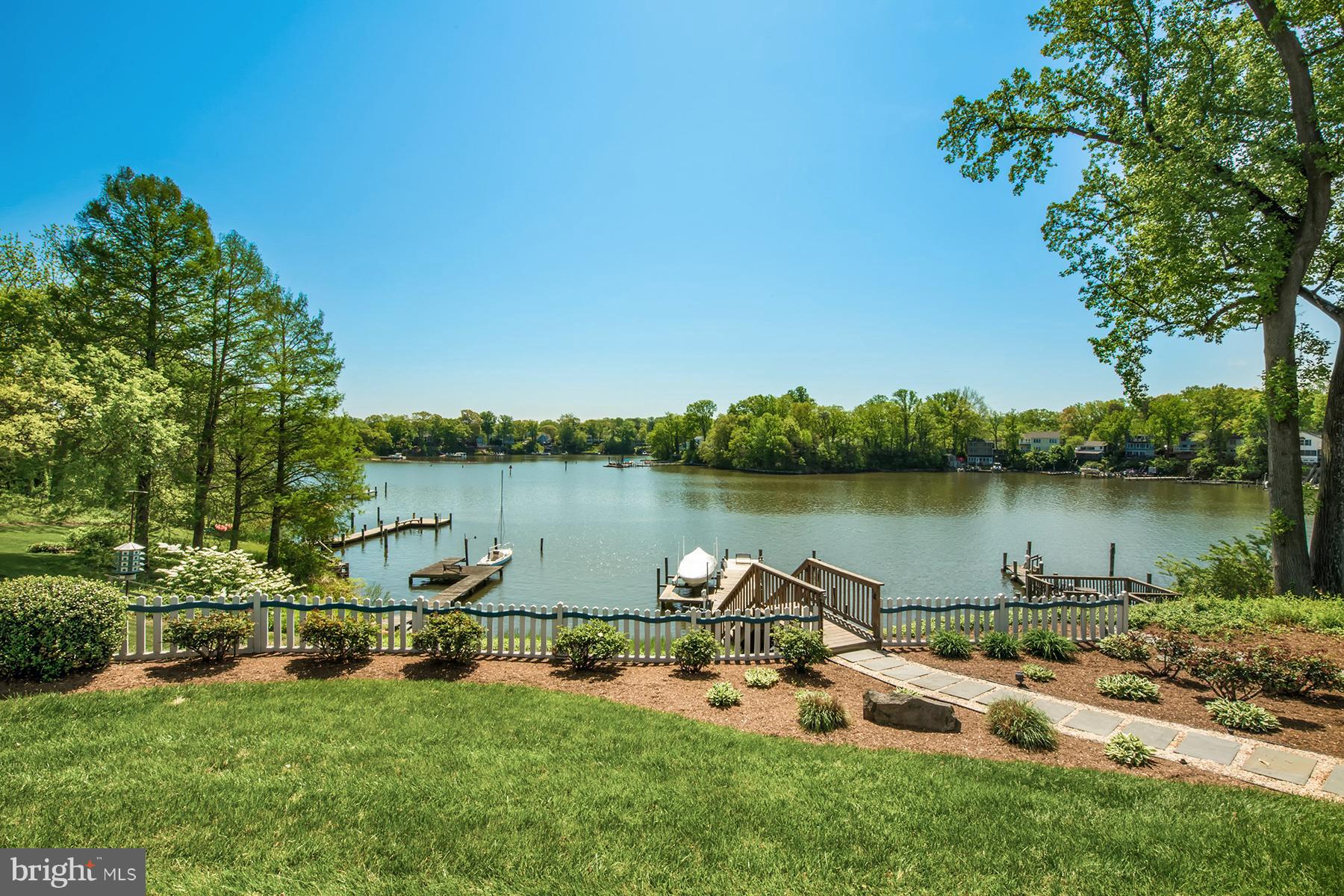503 Broadwater Road Arnold, MD 21012 - Photo 29 of 30 a view of a lake with houses in the back