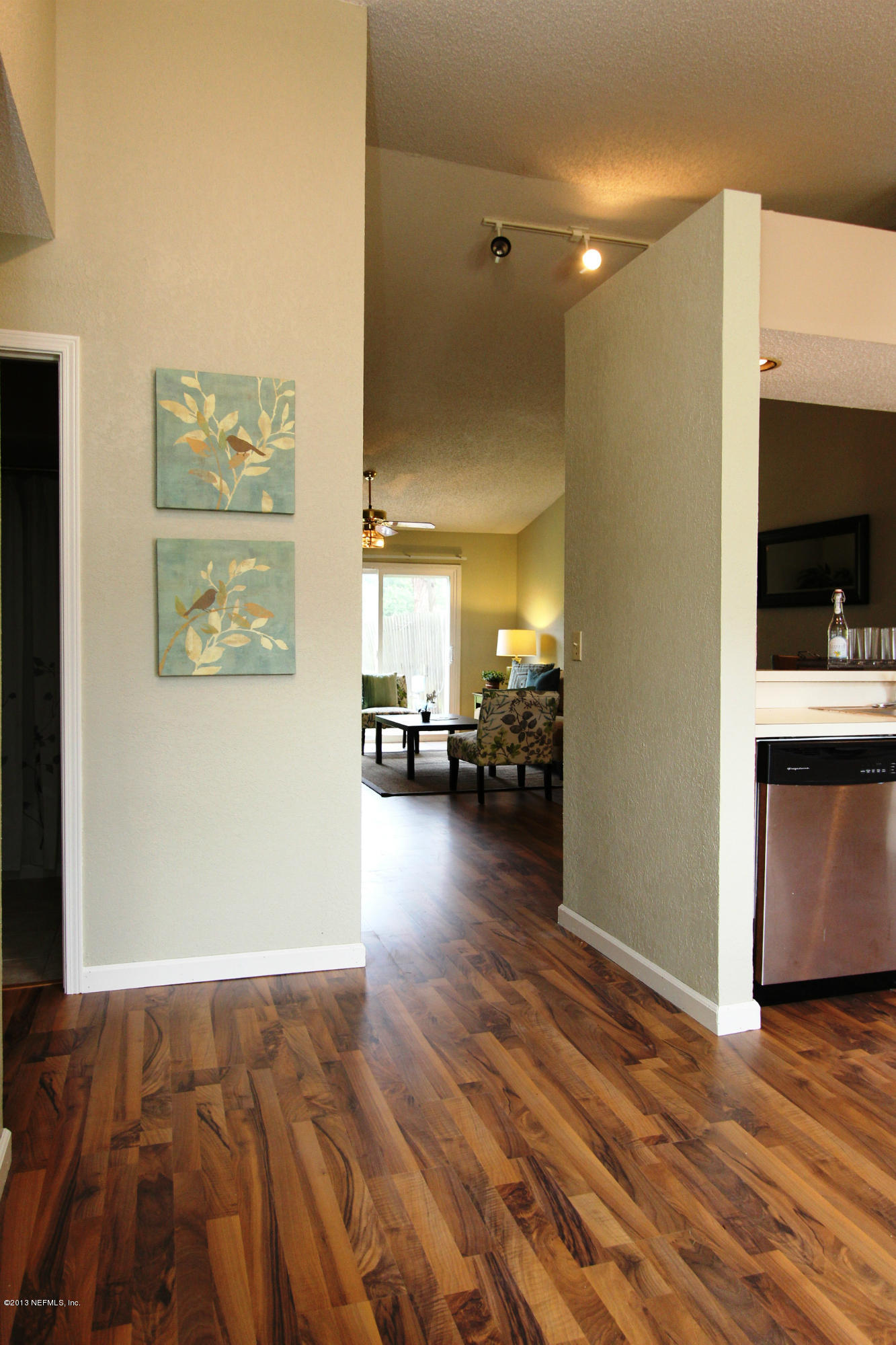 2462 Wattle Tree Road East Jacksonville, FL 32246 - Photo 22 of 35 a view of a living room and hardwood floor
