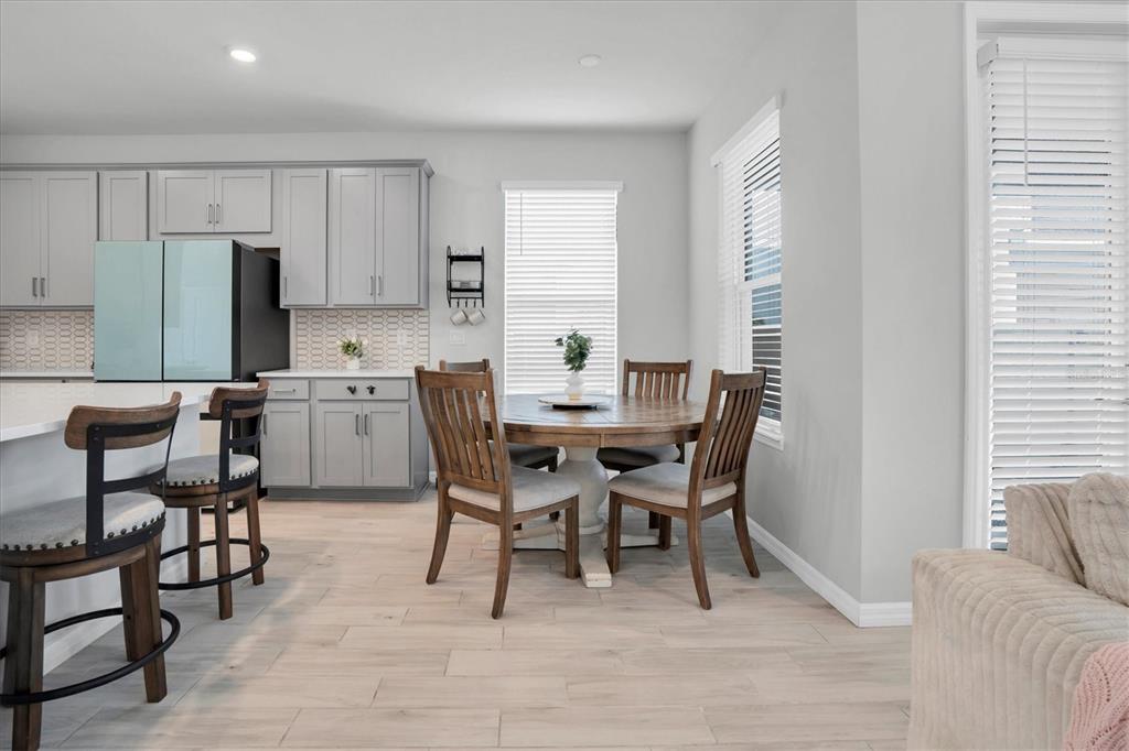 13639 Rangeland Boulevard Odessa, FL 33556 - Photo 14 of 63 a view of a dining room with furniture