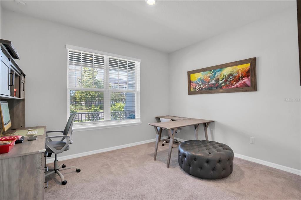 13639 Rangeland Boulevard Odessa, FL 33556 - Photo 27 of 63 a workspace with furniture and a window
