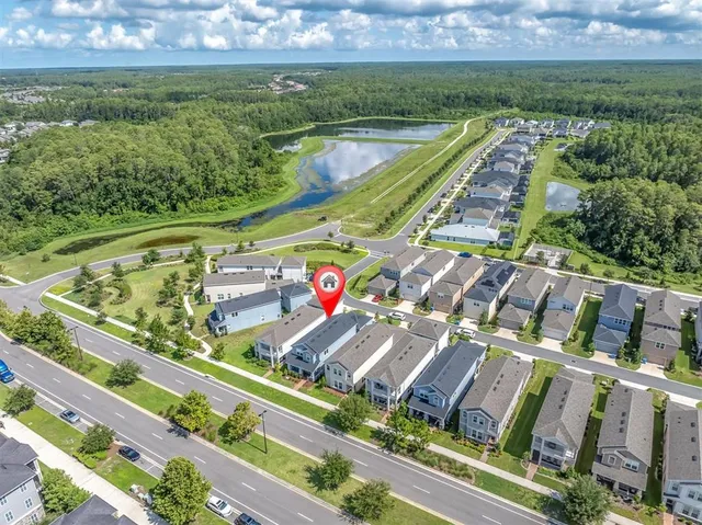 a picture of a bathroom with a refrigerator