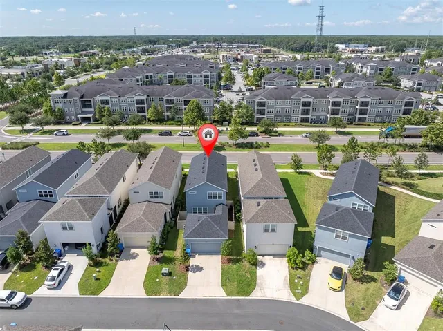a view of a living room and hall with wooden floor