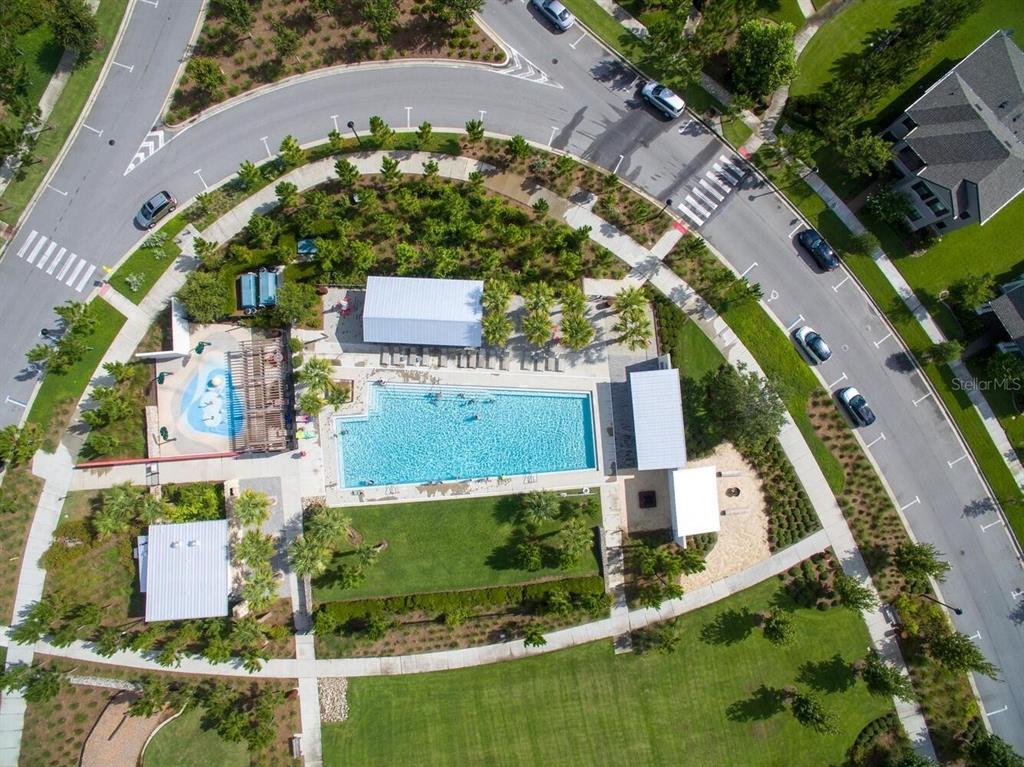 13639 Rangeland Boulevard Odessa, FL 33556 - Photo 57 of 63 an aerial view of a house with a garden