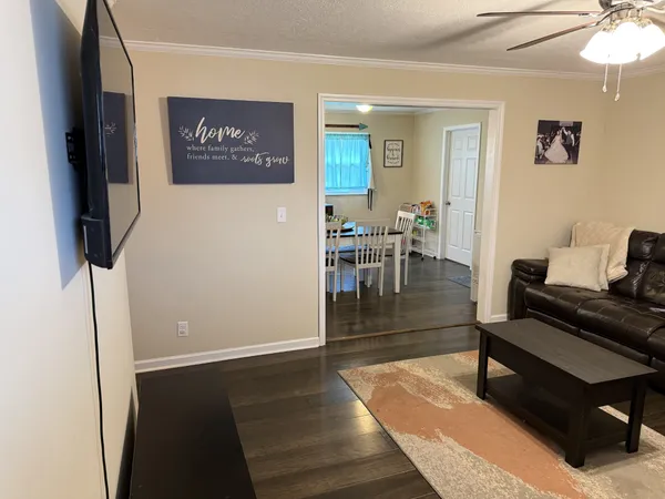 a living room with furniture and a table