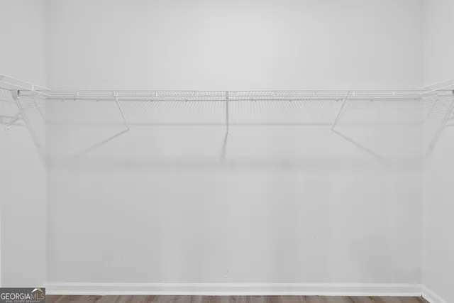 a view of a room with racks on the wall