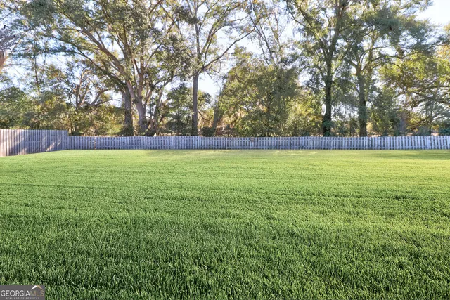 a view of an outdoor space and a yard