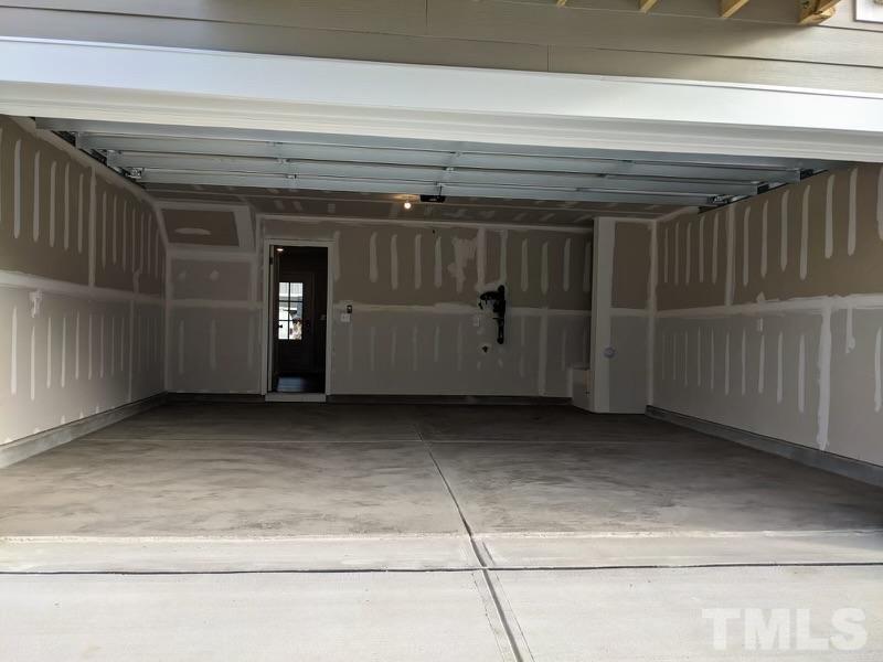 205 Nahunta Drive Apex, NC 27539 - Photo 21 of 24 a view of a garage