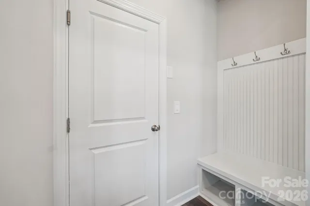 a bathroom with a shower and a sink