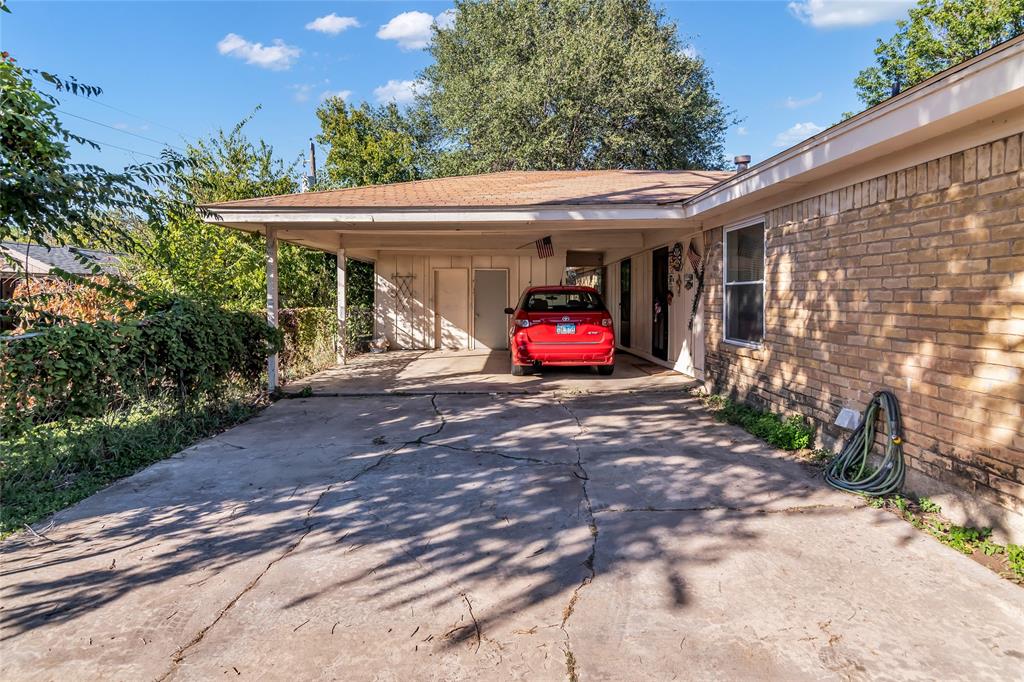 805 Irwin Drive, Unit B Hurst, TX 76053 - Photo 23 of 26 a view of a chairs in front of retail shop