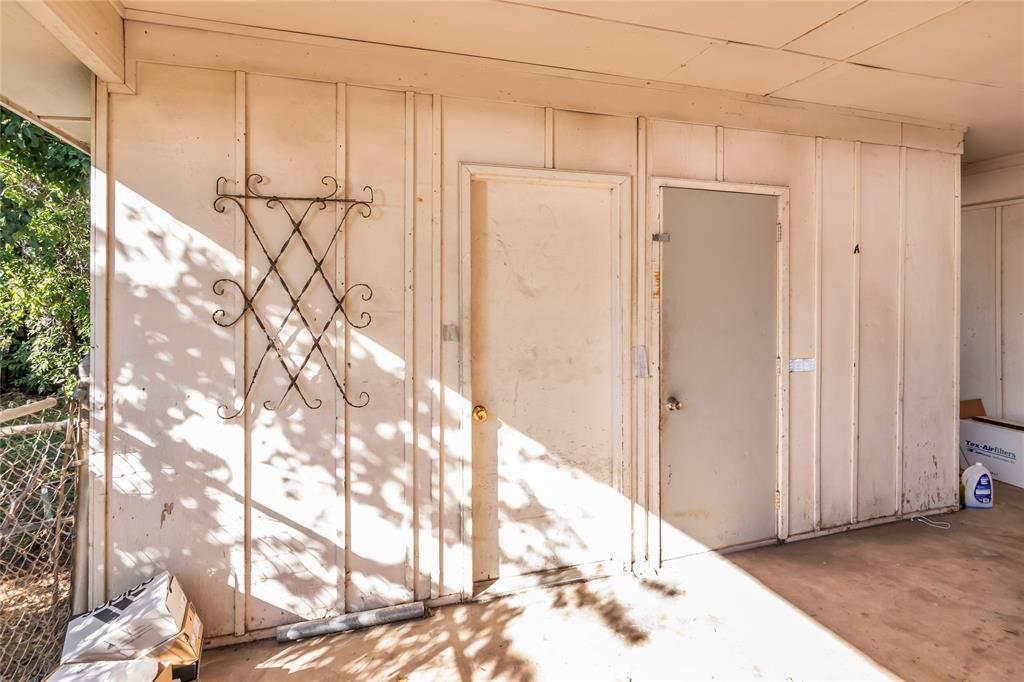 805 Irwin Drive, Unit B Hurst, TX 76053 - Photo 24 of 26 a view of a wooden door
