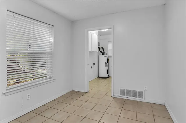 a view of an empty room with window