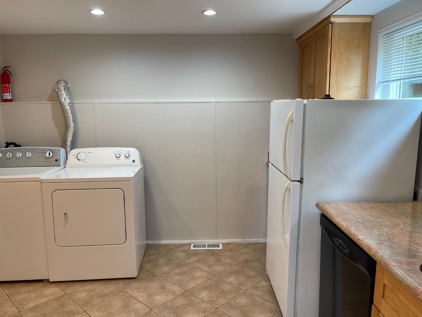 2625 Sequoia Way Belmont, CA 94002 - Photo 15 of 18 a utility room with dryer and washer