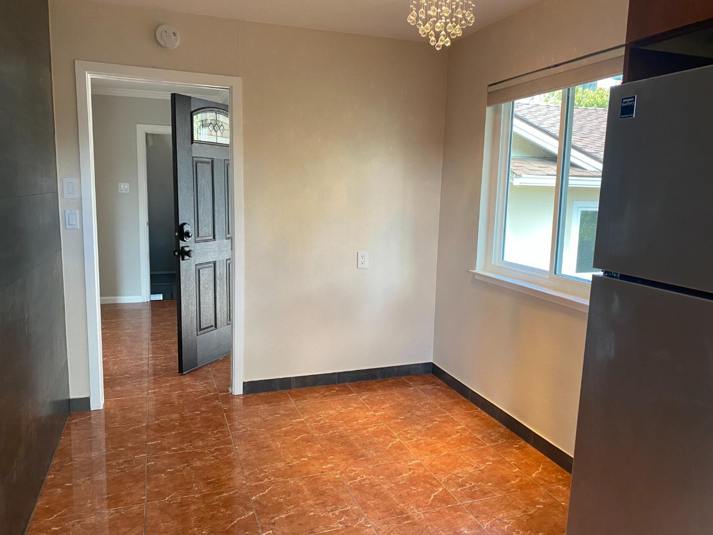 2625 Sequoia Way Belmont, CA 94002 - Photo 3 of 18 an empty room with windows and closet