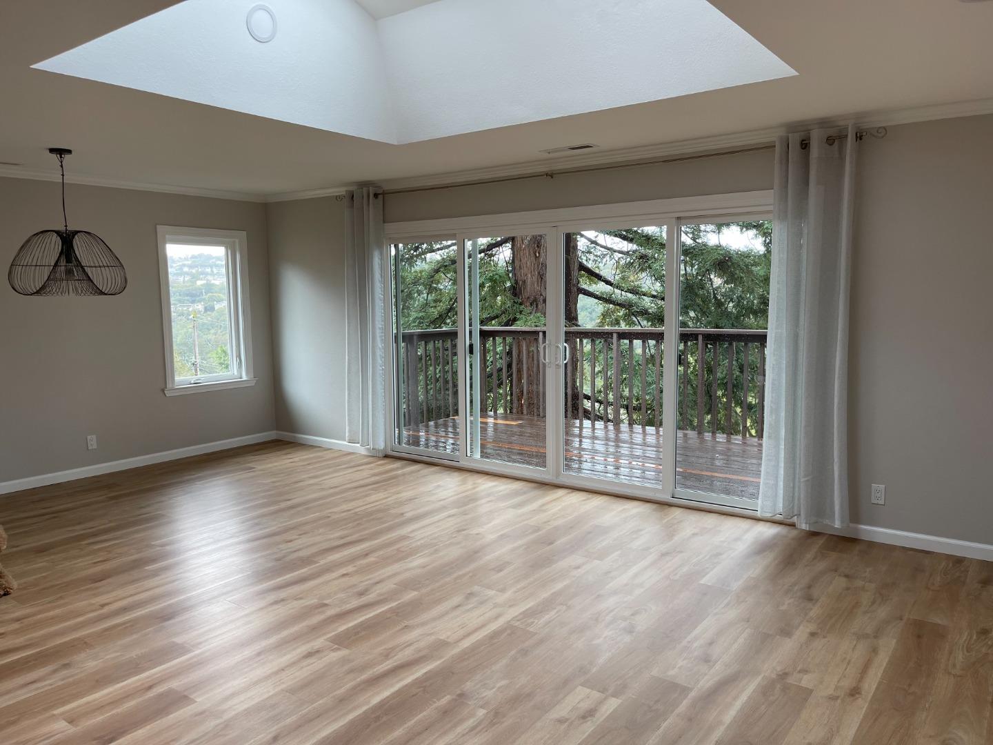 2625 Sequoia Way Belmont, CA 94002 - Photo 5 of 18 wooden floor in an empty room with a window