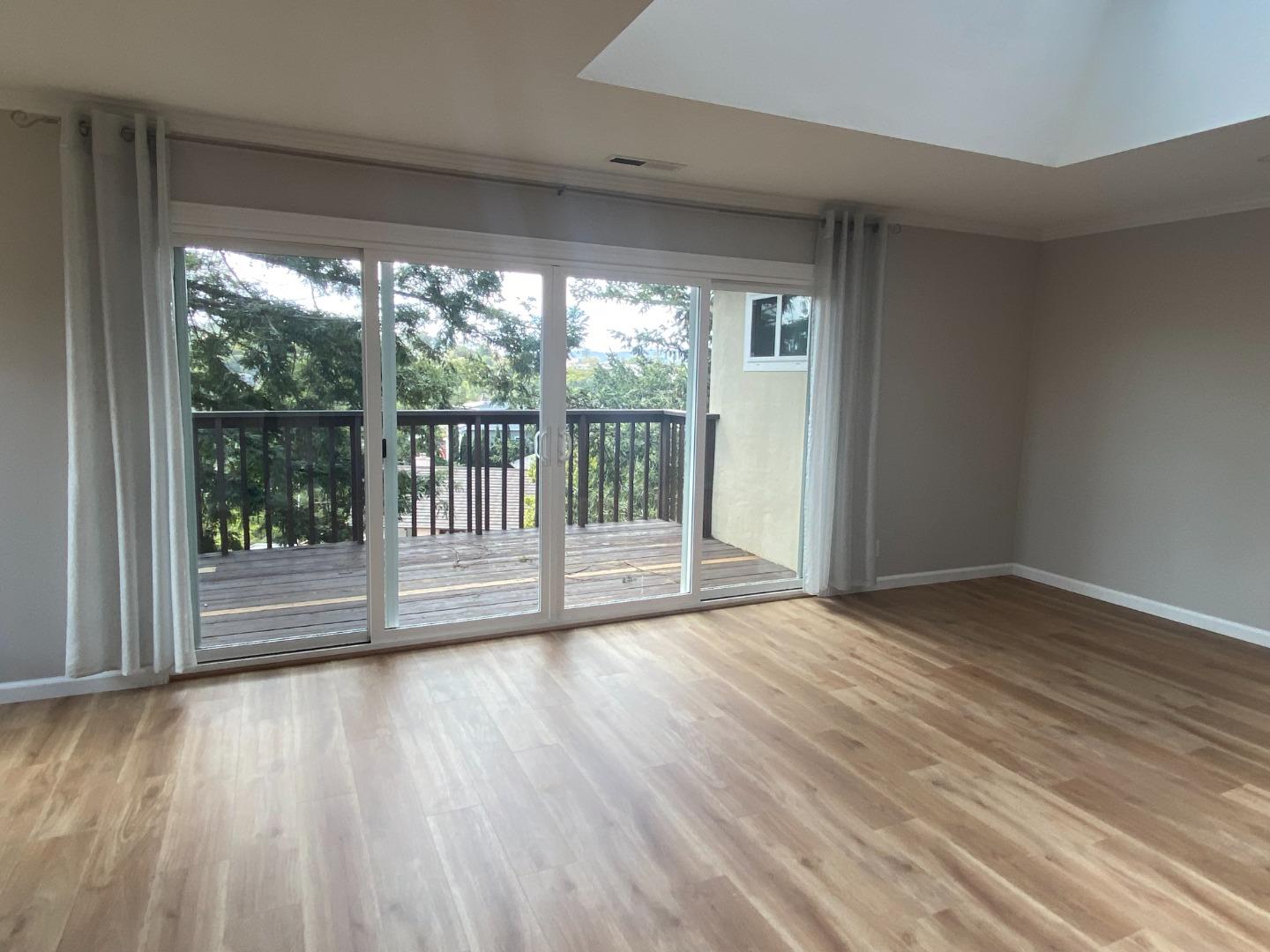 2625 Sequoia Way Belmont, CA 94002 - Photo 6 of 18 a view of empty room with wooden floor and fan