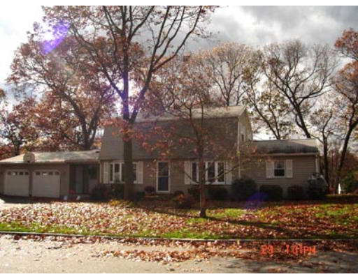 156 Sawmill Road Springfield, MA 01118 - Photo 1 of 5 a front view of a house with a yard