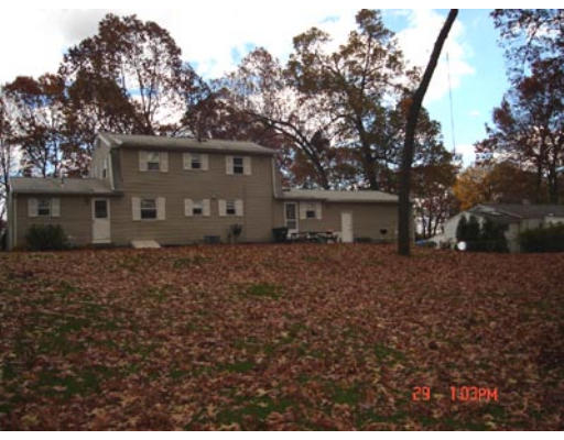 156 Sawmill Road Springfield, MA 01118 - Photo 4 of 5 a view of a house with a garden