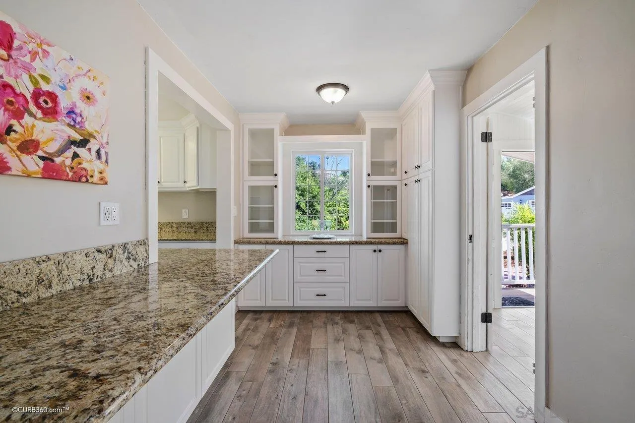 1544 Grove Road El Cajon, CA 92020 - Photo 24 of 42 workspace with wooden floor and window