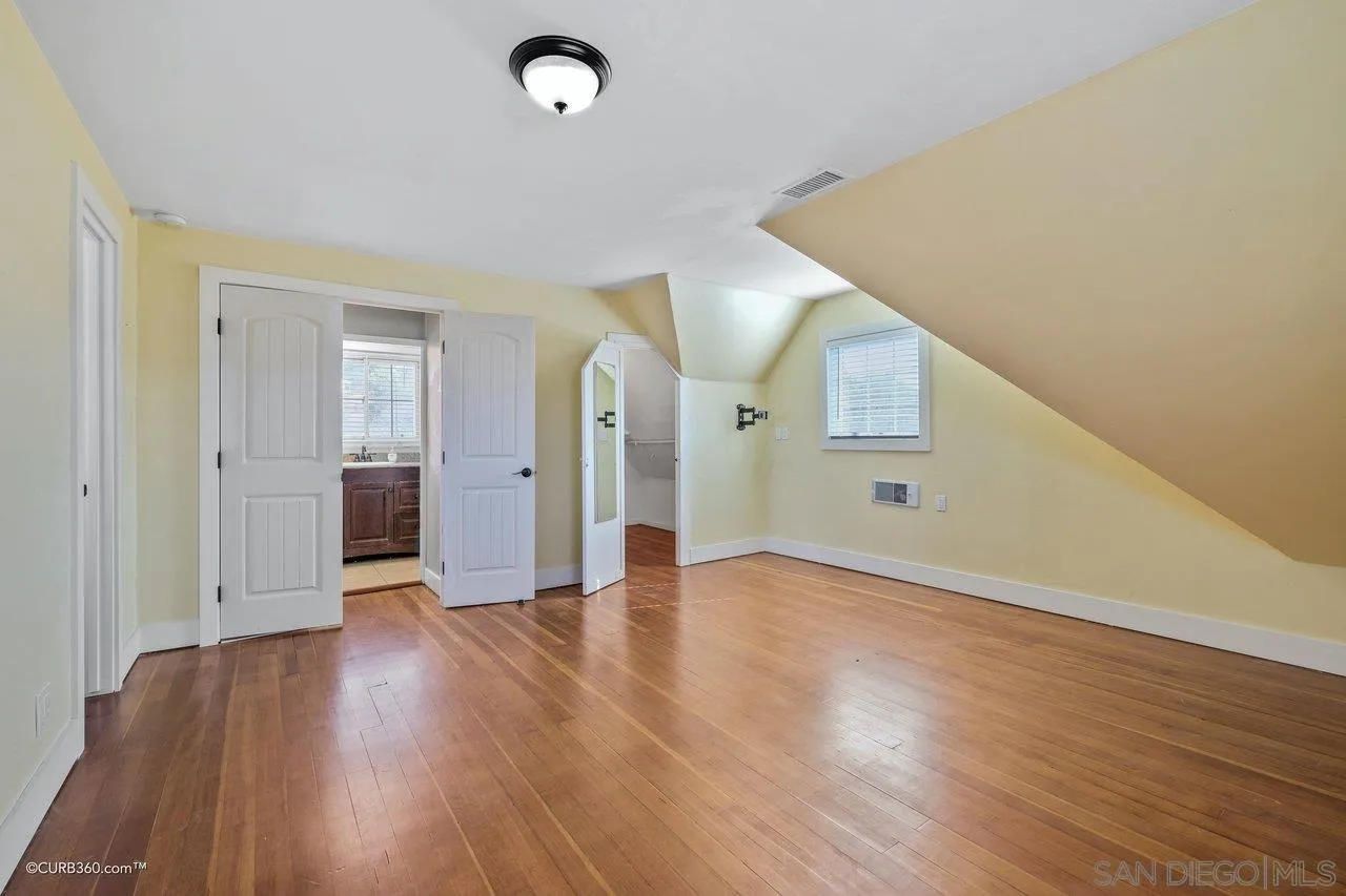 1544 Grove Road El Cajon, CA 92020 - Photo 32 of 42 a view of a livingroom with wooden floor