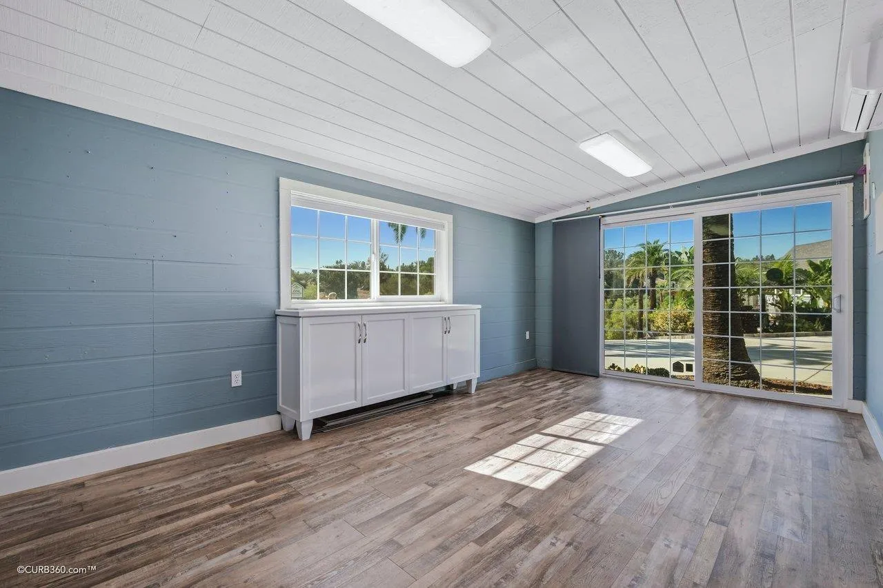 1544 Grove Road El Cajon, CA 92020 - Photo 38 of 42 a view of a room with wooden floor and window