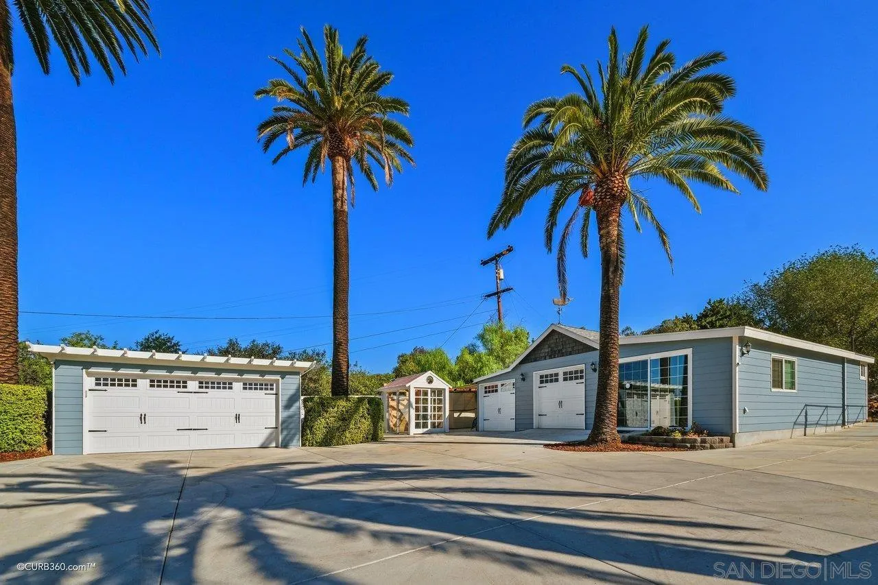 1544 Grove Road El Cajon, CA 92020 - Photo 4 of 42 a front view of multiple houses with palm trees
