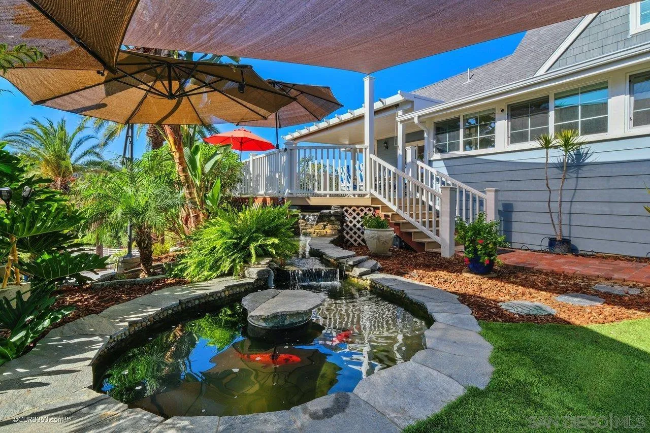 1544 Grove Road El Cajon, CA 92020 - Photo 8 of 42 a view of a house with backyard sitting area and swimming pool