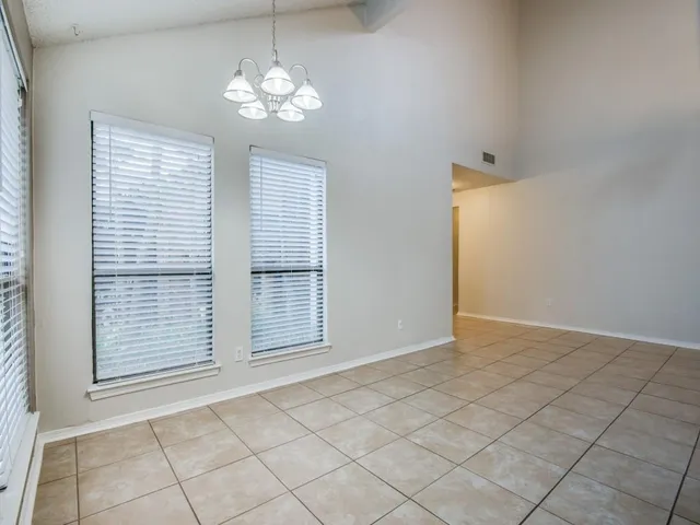 a view of an empty room with window