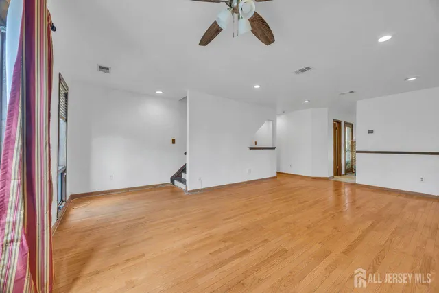 a bedroom with a bed and dresser
