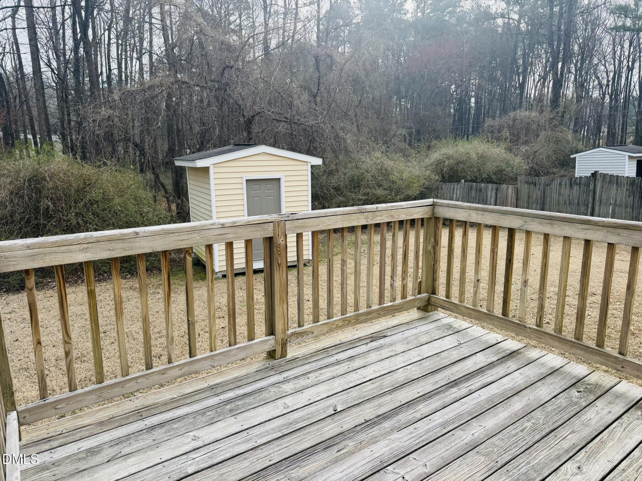 6904 Fox Haven Place Raleigh, NC 27616 - Photo 14 of 17 a balcony with wooden floor