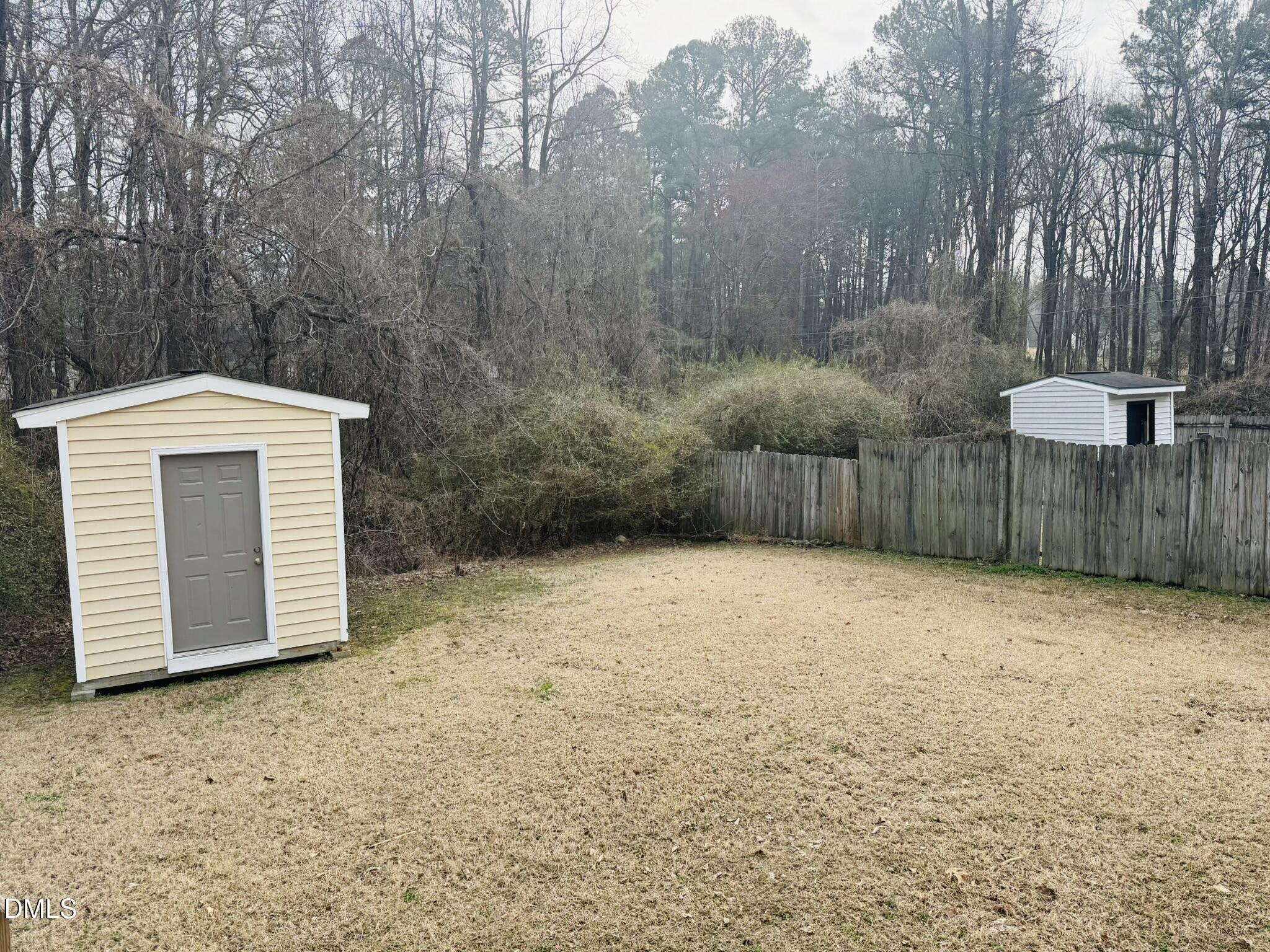 6904 Fox Haven Place Raleigh, NC 27616 - Photo 16 of 17 a view of a backyard