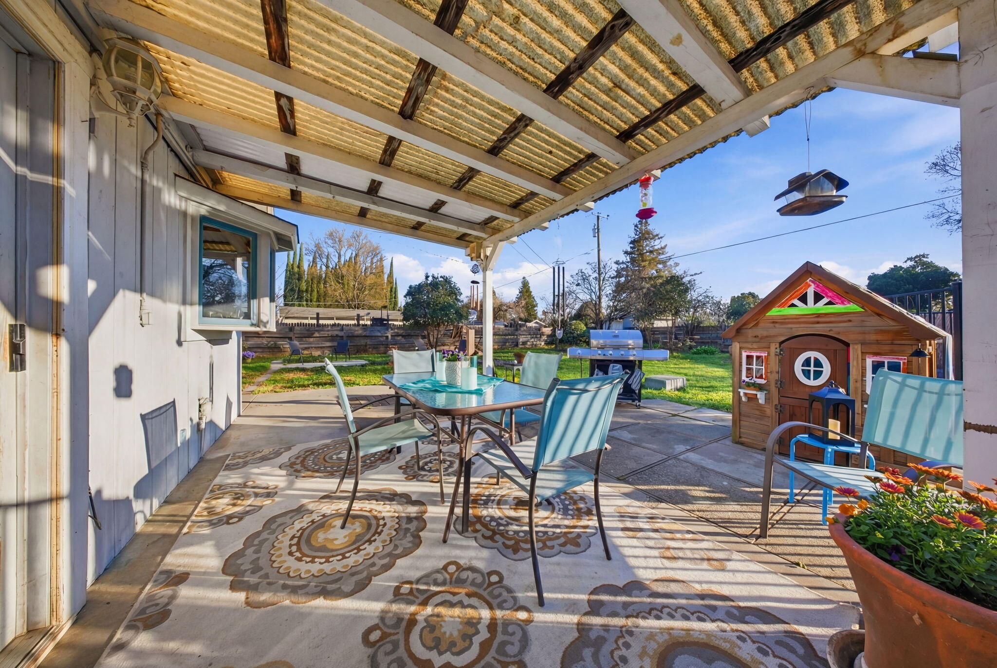 13520 Crystal Street Red Bluff, CA 96080 - Photo 18 of 24 a table and chairs in the patio