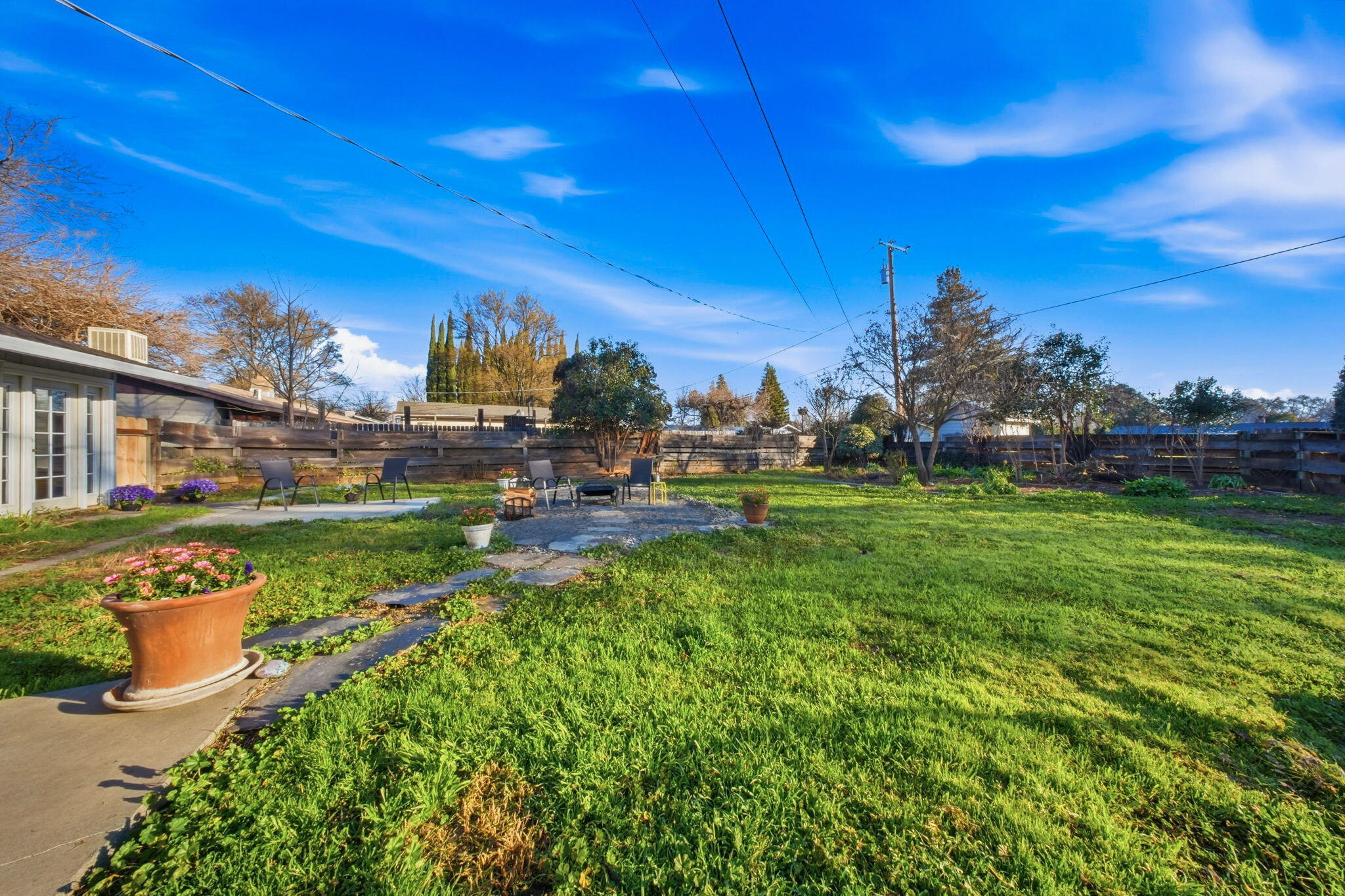 13520 Crystal Street Red Bluff, CA 96080 - Photo 21 of 24 a view of yard with swimming pool and green space