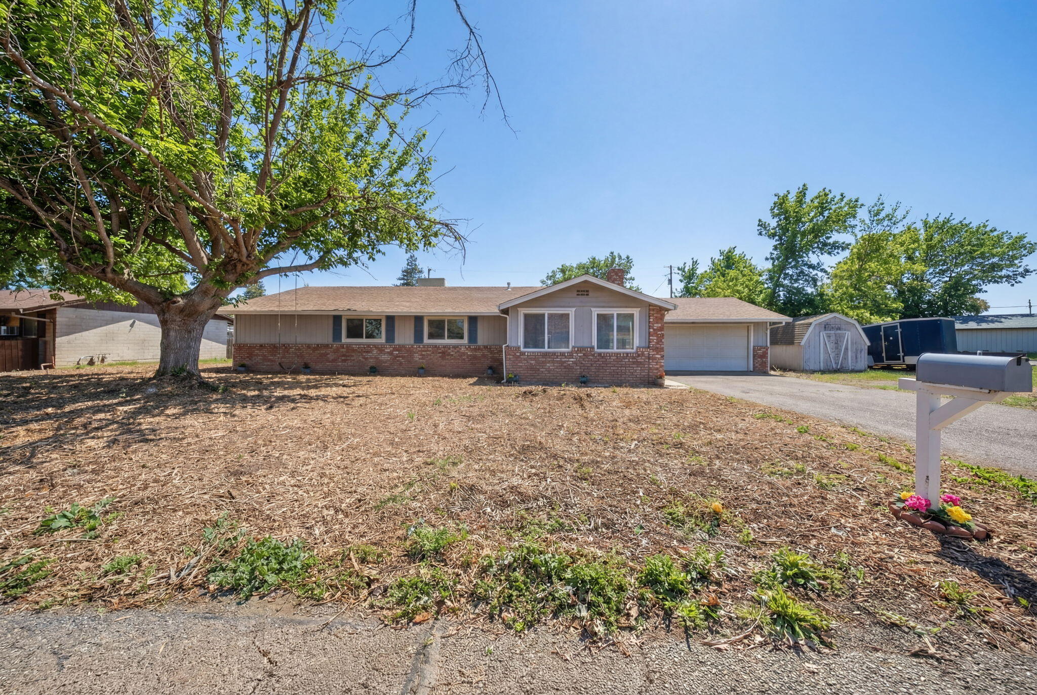 13520 Crystal Street Red Bluff, CA 96080 - Photo 23 of 24 a front view of a house with a yard