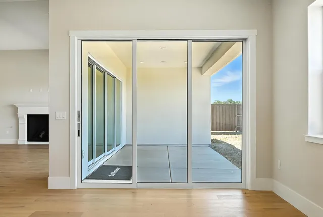 a view of a bathroom with a glass door