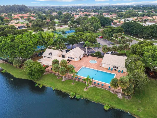 an aerial view of a house with a garden