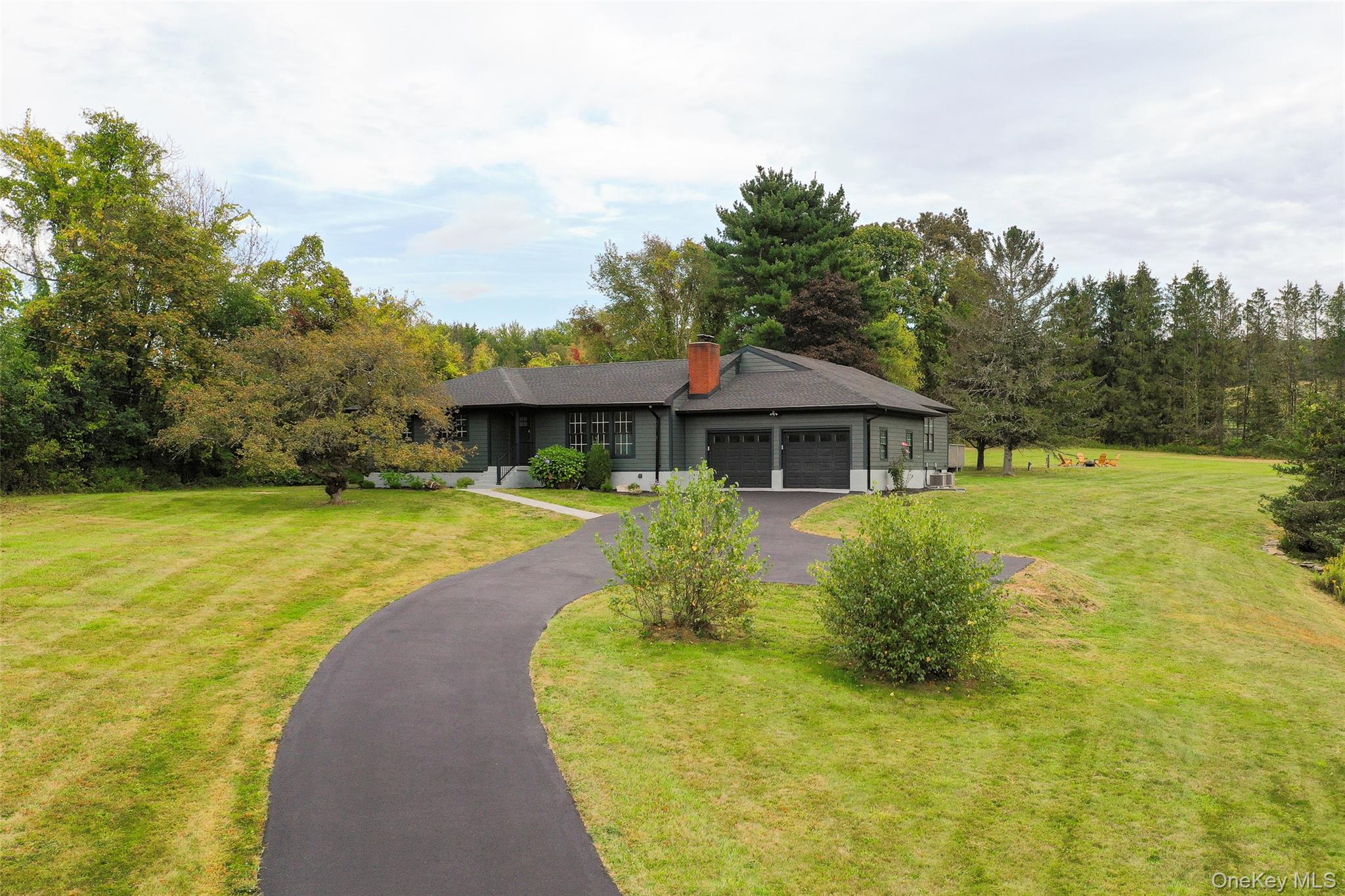 382 Slate Quarry Road Rhinebeck, NY 12572 - Photo 1 of 31 a view of a house with pool and a yard